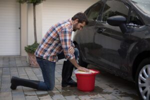 Man washing a car